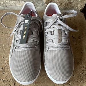 Women’s brand new out n about plus Sorel’s tennis shoe. Size 9 waterproof gray